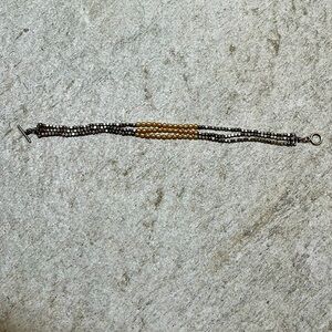 Silver colored and seed pearl bracelet from Sundance